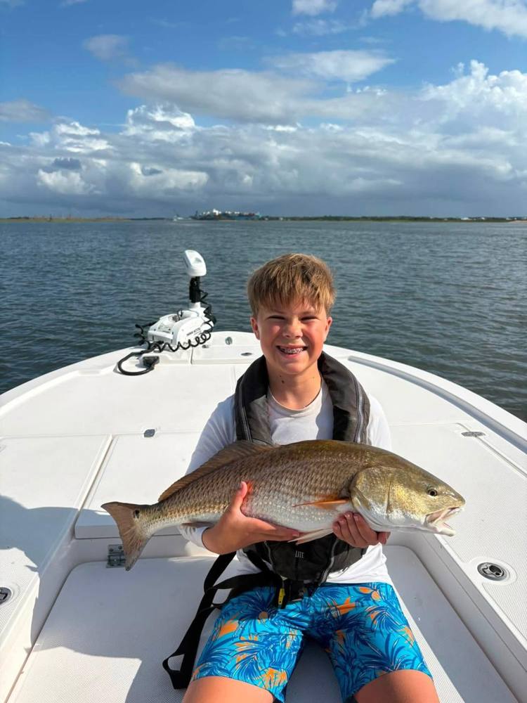 Camper releasing a redfish