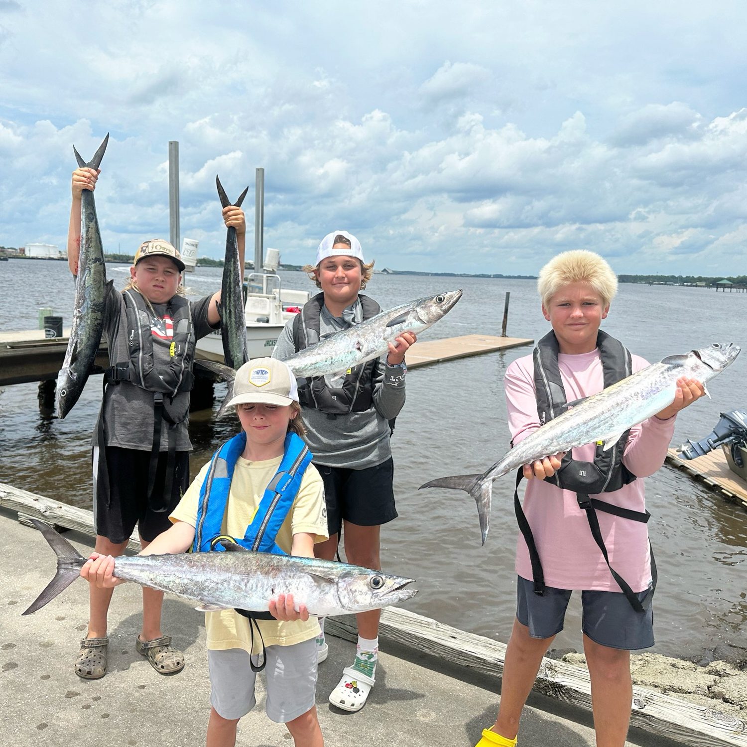 Campers on the dock with the day's kingfish